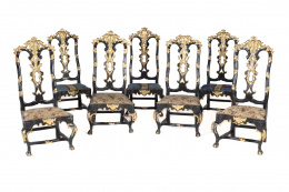 765.  Conjunto de siete sillas, en madera tallada policromada en negro y dorado.España, S. XVIII.