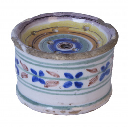 329.  Secante de cerámica esmaltada con cenefa de flores.Levante, S. XIX.
