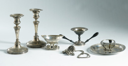 516.  Sonajero de plata en su color con decoración grabada, S. XIX.