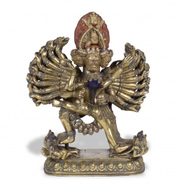 1157.  Dios en bronce con policromia.Tibet, S. XIX-XX