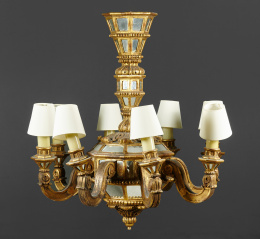 744.  Lámpara de ocho luces en madera tallada y dorada con espejos.S. XX