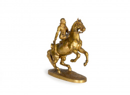 1127.  Mariano Benlliure (1862 - 1937)“Amazona” Escultura en bronce dorado..