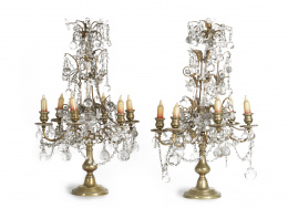 538.  Pareja de Girandoles de seis brazos de luz de estilo Luis XV, de bronce dorado y cristal.Francia, S. XIX.