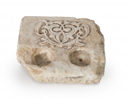 1366.  Fragmento de piedra tallada nazarí..