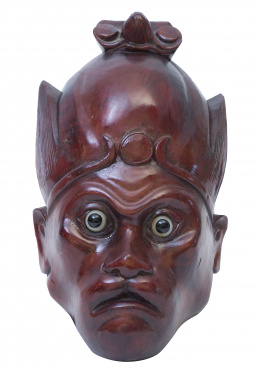 1126.  Máscara de madera tallada, con ojos de vidrio.Trabajo oriental