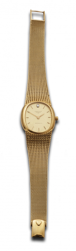 756.  Reloj de pulsera LONGINES en oro de 18K .Automático,años 70.