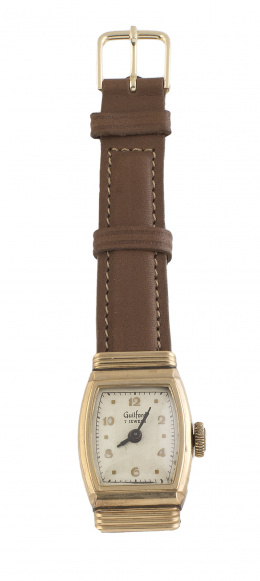 810.  Reloj GUILFORD años 30 en metal plaqué or