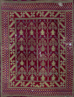 875.  Alfombra de la Alpujarra en lana con decoración geométrica, de pp. del S. XX..