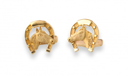 667.  Gemelos con cabezas de caballo en herradura unidos a sistema articulado.