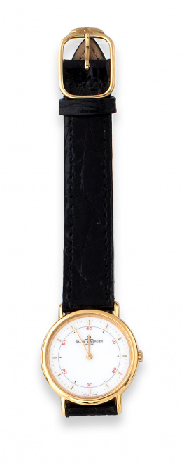 747.  Reloj BAUME ET MERCIER de sra en oro de 18K.