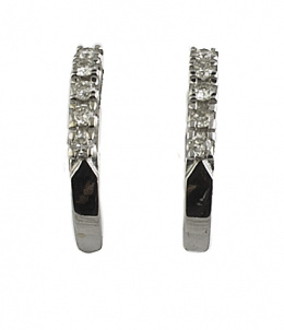 515.  Pendientes de media criolla de brillantes en oro blanco de 18K