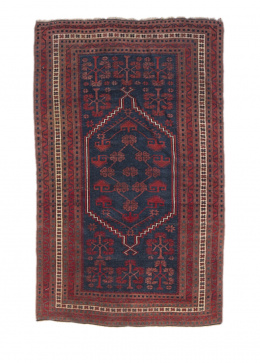 1164.  Alfombra Taspinar en lana anudada a mano en colores azul, rojo y blanco.Turquía S. XX.