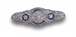 678.  Broche placa Art-Decó brillantes, diamantes y zafiros calibrados en oro de 18K con frente de platino.