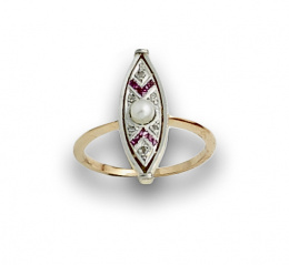 690.  Anillo lanzadera Art-Decó con perla central y rubíes calibrados y diamantes.