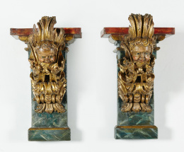 1007.  Pareja de ménsulas barrocas en madera tallada, estucada, policromada y dorada.Trabajo español S. XVII.