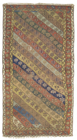 428.  Alfombra turkomana en lana con franjas de color.Afganistan, pp. del S. XIX.
