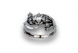 729.  Sortija de brillantes años 50 con brillante central 0,30 entre abanicos de brillantes ,en oro blanco de 18K.