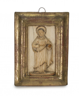 1434.  “San José”Placa en marfil tallado y parcialmente policromado con marco en madera dorada y esgrafiada Escuela hispano - filipina, ff. S. XVII. .