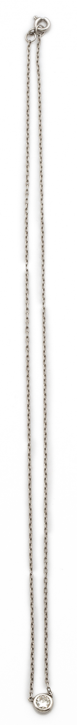 175.  Colgante con brillante en chatón de 0,35 ct con cadena de oro blanco.