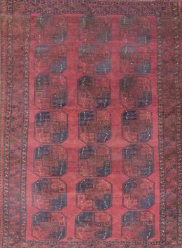 1100.  Alfombra en lana de campo rojo.Trabajo afgano.