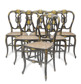 727.  Juego de seis sillas Napoleón III de madera lacada y dorada con asiento de enea.Francia, último cuarto del S. XIX.