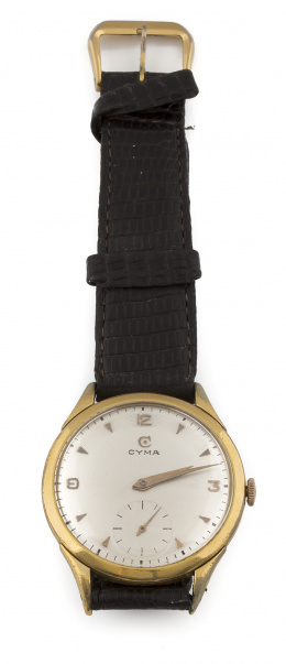 678.  Reloj CYMA años 50 chapado en oro.