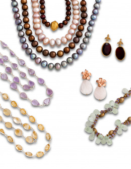 85.  Conjunto de gargantilla y pulsera de cuarzos citrinos ovales facetados en montura de plata.