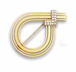 79.  Broche nudo de diseño contemporáneo con “ L “de brillantes que suman 1 cte aprox.
