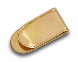78.  Pinza para billetes en oro de 18K con grabado.