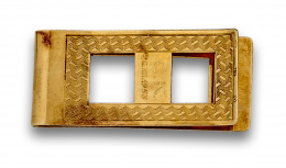 663.  Pinza para billetes en oro de 18K con decoración guilloche.