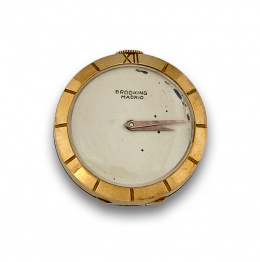658.  Pequeño reloj de mesilla BROOKING MADRID en oro de 18K.