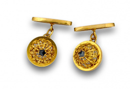 35.  Gemelos de pps s XX con semiesfera de filigrana de oro de 18K y diamantes.