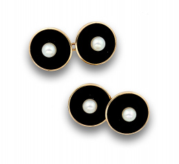 39.  Gemelos dobles con círculos de ónix y  perlas centrales en oro de 14K.