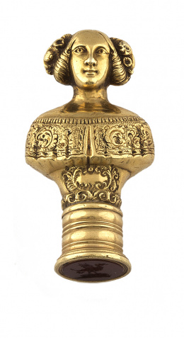 653.  Curioso sello para lacre s.XIX con busto de dama en oro de 18K, t anagrama de dragón alado tallado en cornalina.