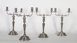 1410.  Conjunto de cuatro candelabros que se transforman en candeleros de estilo Adam.F. Sala, Barcelona, ffs. del S. XVIII - pp. del S. XIX.