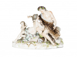 1240.  “Baco”, Grupo de porcelana esmaltada, S. XIX - XX .