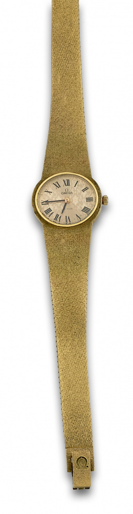 235.  Reloj de pulsera años 60 OMEGA DE VILLE en malla de oro de 18K.