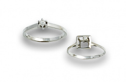 743.  Lote anillo con brillante 0.10 ctes y anillo con circonita en marco cuadrado,ambos en oro blanco de 18K.