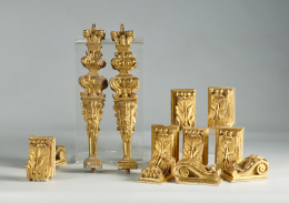 1123.  Dos estípites y diez volutas, en madera estucada  con pan de oro. S.XVII - XVIII..