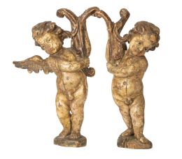 1130.  Pareja de ángeles en madera tallada, estucada y policromada.Trabajo español, S. XVIII.