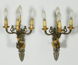 1111.  Pareja de apliques de estilo imperio de cuatro brazos de luz, de bronce dorado y patinado. Trabajo francés, S. XIX..