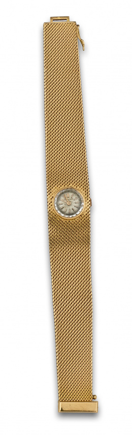 237.  Reloj de pulsera LONGINES años 60 en malla ancha de oro de 18K.