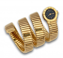 243.  Reloj BVLGARI tubogas con brazalete serpiente de tres vueltas en oro de 18K. Ref:BB 19 1T.  P.74318