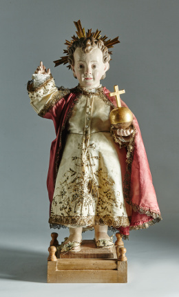 1169.  Niño Jesús salvador del mundo  en madera tallada y policromada,ff. XVII - pp. XVIII.