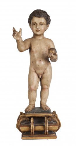 1138.  Niño Jesús Salvator Mundi.Escultura en madera tallada y policromada, siguiendo modelos del S. XVII .Trabajo español, S. XIX-XX.
