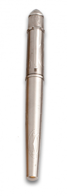 790.  Bolígrafo CARTIER plateado con decoración estriada combinada con anagrama.