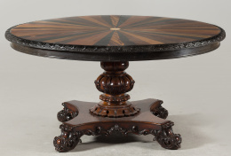 466.  Mesa de centro con marquetería de maderas exóticas o “”especimen wood” y madera de ébano tallado.Trabajo anglo-indio, Ceylan, h. 1830-1840..
