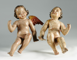 1170.  Pareja de ángeles en madera tallada, estucada y policromada.España, S. XVIII. .