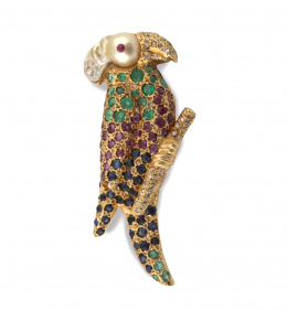 221.  Broche en forma de papagayo con brillantes, rubíes, esmeraldas, zafiros y cabeza de perla barroca