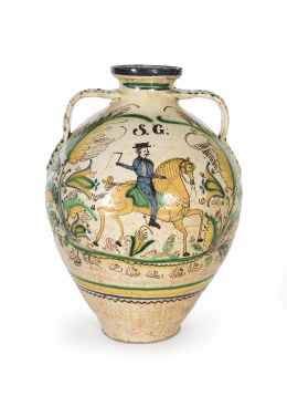 1338.  Orza de cerámica de Puente del Arzobispo esmaltada con un jinete entre hojas, Sebastián García Año de 1872..